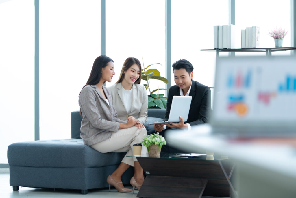 Young entrepreneurs in Asia Take a break to relax in the relaxation room after a meeting.